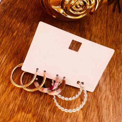 پک سه عددی گوشواره حلقه ای نقره ای پیج طلایی ساده و طرح سنگ